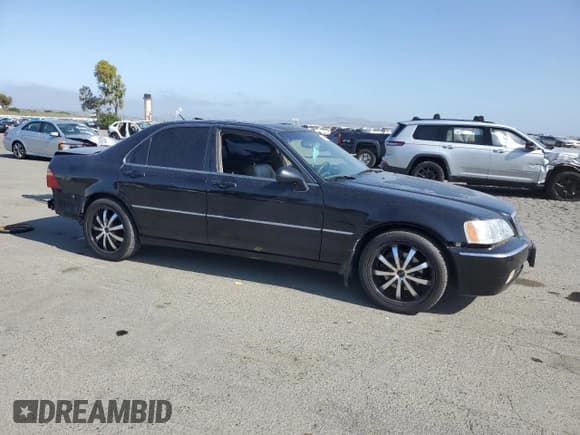 ✅ 2002 Acura RL • VIN: JH4KA96592C001872 • Lot: 55144775. Listed on Copart with Not provided. Free auction sales archive from the USA and detailed vehicle history report at DreamBid. Image 4.
