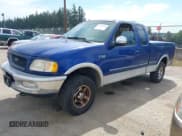 ✅ 1997 Ford F-150 XL • VIN: 1FTDX18W1VKC71818 • Lot: 42871300. Listed on IAAI with 237,082 mi. Free auction sales archive from the USA and detailed vehicle history report at DreamBid. Image 2.