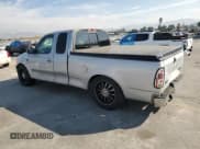 ✅ 2001 Ford F-150 XL • VIN: 1FTRX17L41KF48422 • Lot: 67605465. Listed on Copart with Not provided. Free auction sales archive from the USA and detailed vehicle history report at DreamBid. Image 2.