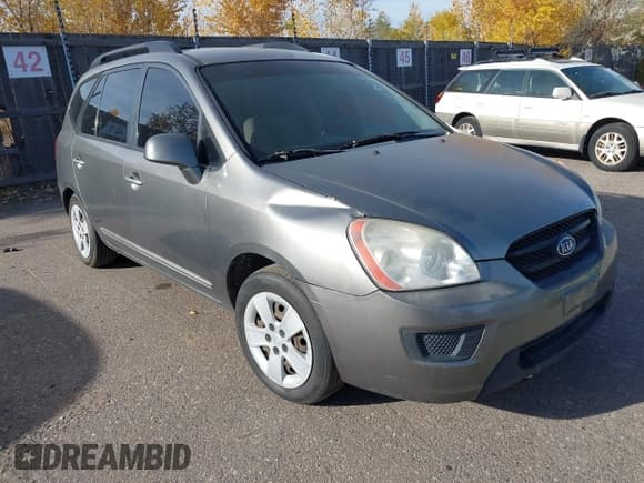 ✅ 2009 Kia Rondo LX • VIN: KNAFG528397255409 • Lot: 43550345. Listed on IAAI with 199,636 mi. Free auction sales archive from the USA and detailed vehicle history report at DreamBid. Image 1.