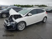 ✅ 2017 Ford Focus Titanium • VIN: 1FADP3N23HL244301 • Lot: 56625555. Listed on Copart with 96,304 mi. Free auction sales archive from the USA and detailed vehicle history report at DreamBid. Image 1.
