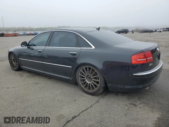 ✅ 2010 Audi A8 • VIN: WAURVAFA7AN006264 • Lot: 55554305. Listed on Copart with Not provided. Free auction sales archive from the USA and detailed vehicle history report at DreamBid. Image 2.