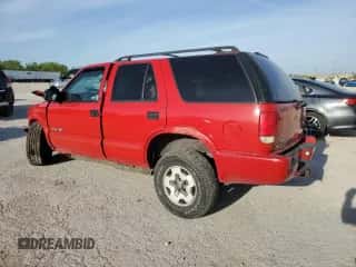 2002 Chevrolet Blazer LS z VIN 1GNDT13W12K191392, wystawiony jako Copart lot #51730254 z przebiegiem Nie podano mil oraz Szkoda całkowita • Salvage title. Historia ofert i sprzedaży dostępna na DreamBid. Obrazek 2.