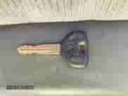 1991 Dodge Dakota z VIN 1B7FL23X5MS335433, wystawiony jako IAAI lot #41149799 z przebiegiem Nie podano mil oraz . Historia ofert i sprzedaży dostępna na DreamBid. Obrazek 11.