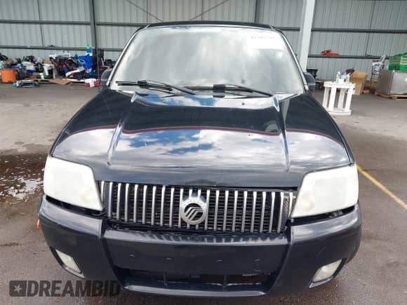 2006 Mercury Mariner Luxury with VIN 4M2YU56106KJ09196, listed as a IAAI auction lot 43307535 with 208,433 mi miles and . Bid and sale history available at DreamBid. Image 6.