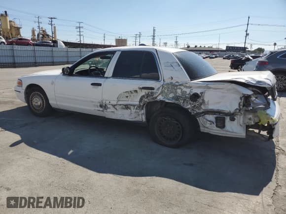 ✅ 1999 Ford Crown Victoria Police • VIN: 2FAFP71W0XX222766 • Lot: 82093825. Wystawiony na Copart z przebiegiem 97 010 mil. Bezpłatny archiwum sprzedaży aukcyjnych z USA i szczegółowy raport historii pojazdu na DreamBid. Zdjęcie 2.