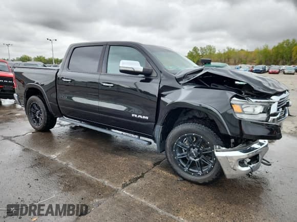 ✅ 2019 Ram 1500 Laramie • VIN: 1C6SRFJT6KN677464 • Lot: 85306355. Listed on Copart with 97,808 mi. Free auction sales archive from the USA and detailed vehicle history report at DreamBid. Image 4.