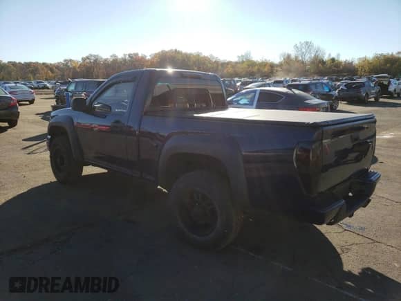 2012 Chevrolet Colorado Work Truck with VIN 1GCGTBFE3C8125018, listed as a Copart auction lot 90024745 with 156,864 mi miles and Salvage title. Bid and sale history available at DreamBid. Image 2.