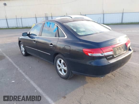 2006 Hyundai Azera SE with VIN KMHFC46F56A114031, listed as a IAAI auction lot 43610131 with 119,506 mi miles and . Bid and sale history available at DreamBid. Image 3.