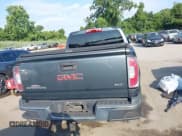 ✅ 2015 GMC Canyon 4WD SLT • VIN: 1GTG6CE31F1214936 • Lot: 42950344. Listed on IAAI with 165,149 mi. Free auction sales archive from the USA and detailed vehicle history report at DreamBid. Image 16.