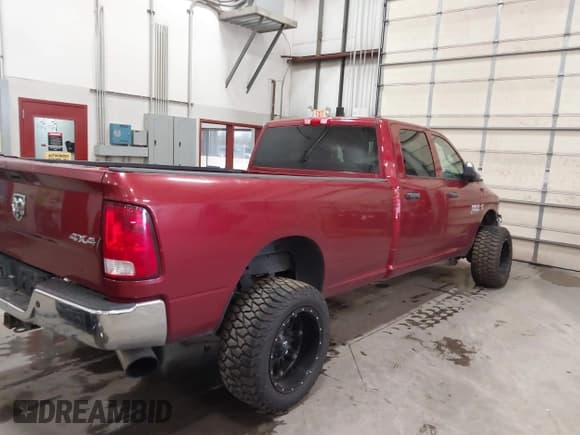 ✅ 2015 Ram 2500 Tradesman • VIN: 3C6UR5HL4FG528090 • Lot: 41372919. Listed on IAAI with 131,249 mi. Free auction sales archive from the USA and detailed vehicle history report at DreamBid. Image 4.