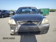 ✅ 2003 Kia Rio • VIN: KNADC125936223322 • Lot: 51961215. Wystawiony na Copart z przebiegiem 89 449 mil. Bezpłatny archiwum sprzedaży aukcyjnych z USA i szczegółowy raport historii pojazdu na DreamBid. Zdjęcie 5.