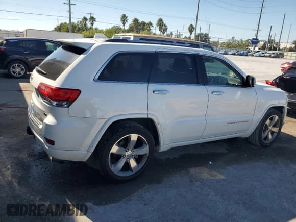 ✅ 2014 Jeep Grand Cherokee Overland • VIN: 1C4RJFCG1EC279478 • Lot: 91217535. Listed on Copart with 116,853 mi. Free auction sales archive from the USA and detailed vehicle history report at DreamBid. Image 3.