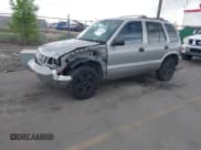 ✅ 2000 Kia Sportage • VIN: KNDJA7231Y5651234 • Lot: 42100284. Listed on IAAI with 192,122 mi. Free auction sales archive from the USA and detailed vehicle history report at DreamBid. Image 2.