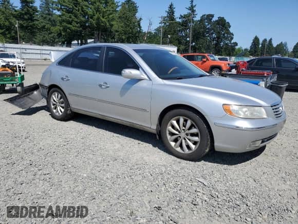 2007 Hyundai Azera SE с VIN KMHFC46F77A241607, выставлен на аукционе Copart как лот 59318345 с пробегом 198 664 миль миль и Списание • Salvage title. История ставок и продаж доступна на DreamBid. Изображение 4.