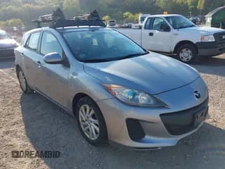 ✅ 2012 Mazda 3 i Touring • VIN: JM1BL1L7XC1583979 • Lot: 43255416. Listed on IAAI with 174,081 mi. Free auction sales archive from the USA and detailed vehicle history report at DreamBid. Image 1.