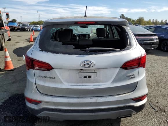✅ 2018 Hyundai Santa Fe 2.4L • VIN: 5XYZTDLB9JG549078 • Лот: 71850003. Опубликован ранее на Copart с пробегом Не указан. Бесплатный доступ к архиву аукционных продаж из США и подробный отчёт об истории автомобиля на DreamBid. Изображение 6.