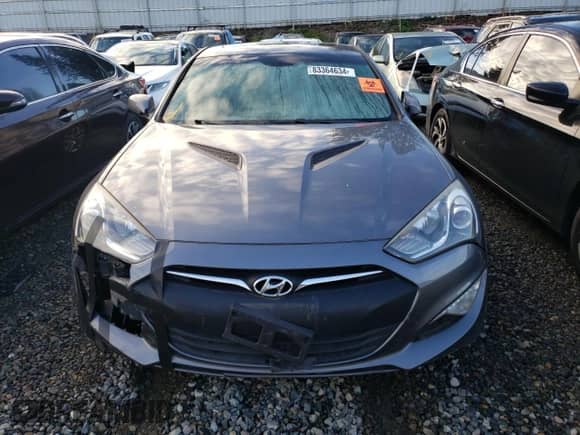 2014 Hyundai Genesis Coupe 2.0T z VIN KMHHT6KD6EU119079, wystawiony jako Copart lot #83364634 z przebiegiem 85 647 mil mil oraz Szkoda całkowita • Salvage title. Historia ofert i sprzedaży dostępna na DreamBid. Obrazek 5.