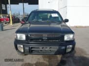 ✅ 1999 Infiniti QX4 • VIN: JNRAR05Y3XW047670 • Lot: 43757053. Listed on IAAI with 142,059 mi. Free auction sales archive from the USA and detailed vehicle history report at DreamBid. Image 6.