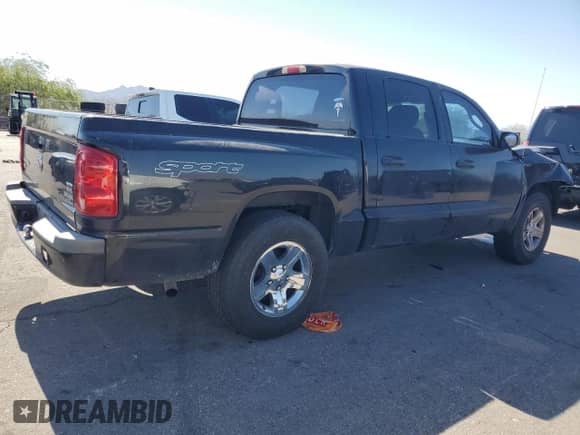 2006 Dodge Dakota SLT z VIN 1D7HE48N76S688934, wystawiony jako Copart lot #75057094 z przebiegiem 235 087 mil mil oraz Szkoda całkowita • Salvage title. Historia ofert i sprzedaży dostępna na DreamBid. Obrazek 3.
