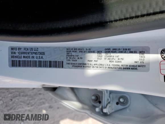 2023 Ram 1500 Tradesman z VIN 1C6RRENTXPN573635, wystawiony jako Copart lot #70497975 z przebiegiem 64 595 mil mil oraz Szkoda całkowita • Salvage title. Historia ofert i sprzedaży dostępna na DreamBid. Obrazek 13.