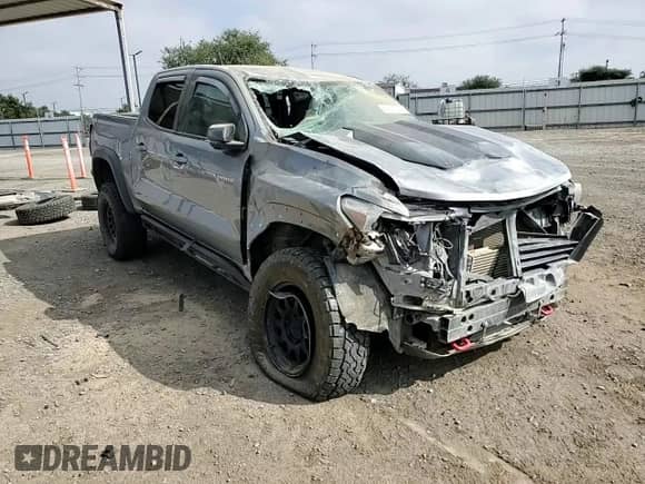2023 Chevrolet Colorado 4WD ZR2 with VIN 1GCPTFEK5P1235565, listed as a Copart auction lot 61607045 with 42,500 mi miles and Salvage title. Bid and sale history available at DreamBid. Image 14.