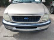 ✅ 1997 Ford F-150 • VIN: 1FTDF1766VNA20506 • Lot: 42621475. Listed on IAAI with 419,765 mi. Free auction sales archive from the USA and detailed vehicle history report at DreamBid. Image 10.