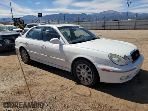 2002 Hyundai Sonata GLS с VIN KMHWF35H12A624164, выставлен на аукционе Copart как лот 72606564 с пробегом 89 040 миль миль и На запчасти • Non repairable. История ставок и продаж доступна на DreamBid. Изображение 4.