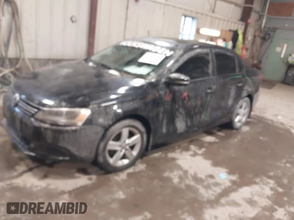 ✅ 2012 Volkswagen Jetta TDI • VIN: 3VWLL7AJXCM031579 • Lot: 41227325. Listed on IAAI with 123,273 mi. Free auction sales archive from the USA and detailed vehicle history report at DreamBid. Image 2.