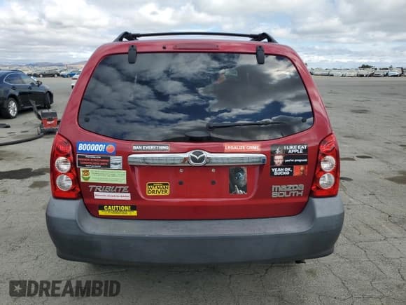 ✅ 2006 Mazda Tribute i • VIN: 4F2YZ02Z66KM13896 • Lot: 80320115. Listed on Copart with 107,951 mi. Free auction sales archive from the USA and detailed vehicle history report at DreamBid. Image 6.