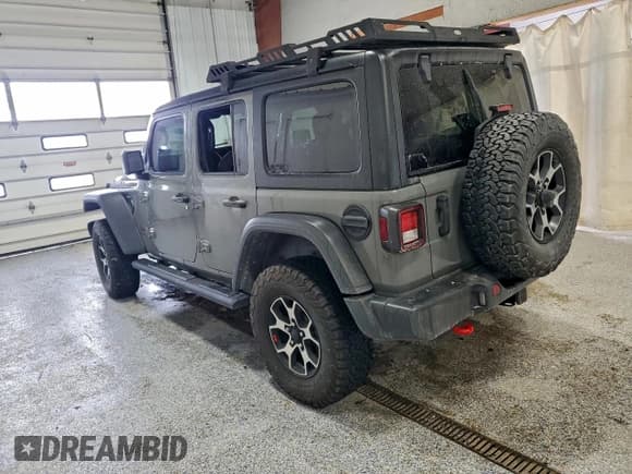 ✅ 2023 Jeep Wrangler Rubicon • VIN: 1C4HJXFN8PW543468 • Lot: 90111665. Listed on Copart with 35,492 mi. Free auction sales archive from the USA and detailed vehicle history report at DreamBid. Image 2.