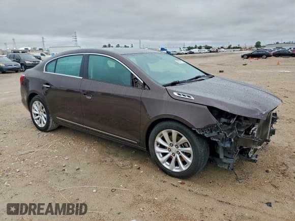 ✅ 2015 Buick LaCrosse Leather • VIN: 1G4GB5G39FF306069 • Лот: 95307135. Опубликован ранее на Copart с пробегом 159 224 миль. Бесплатный доступ к архиву аукционных продаж из США и подробный отчёт об истории автомобиля на DreamBid. Изображение 4.