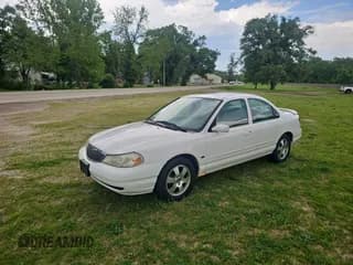 ✅ 1998 Mercury Mystique • VIN: 1MEFM66L2WK653881 • Лот: 57662125. Опубликован ранее на Copart с пробегом 119 189 миль. Бесплатный доступ к архиву аукционных продаж из США и подробный отчёт об истории автомобиля на DreamBid. Изображение 2.