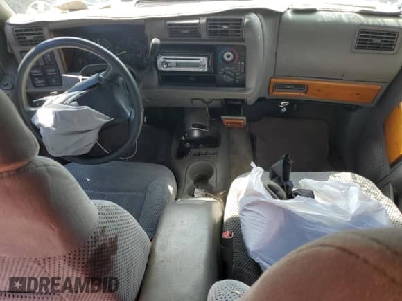 1995 Chevrolet Blazer z VIN 1GNCS13W3SK128695, wystawiony jako Copart lot #72432754 z przebiegiem 162 645 mil mil oraz Szkoda całkowita • Salvage title. Historia ofert i sprzedaży dostępna na DreamBid. Obrazek 8.