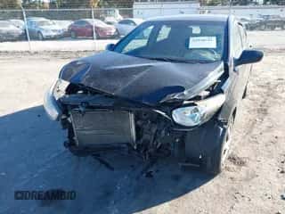 2012 Hyundai Accent GS with VIN KMHCT5AE6CU045643, listed as a IAAI auction lot 43526721 with 242,513 mi miles and . Bid and sale history available at DreamBid. Image 6.
