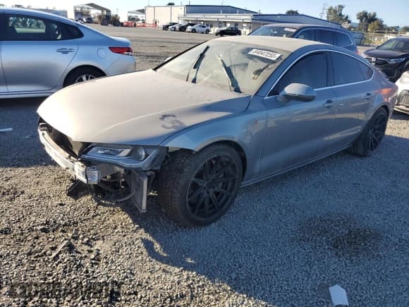 ✅ 2014 Audi A7 Premium Plus • VIN: WAUWGAFC7EN074732 • Лот: 84047255. Опубликован ранее на Copart с пробегом Не указан. Бесплатный доступ к архиву аукционных продаж из США и подробный отчёт об истории автомобиля на DreamBid. Изображение 1.