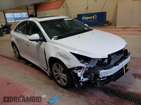 ✅ 2015 Chevrolet Cruze LTZ • VIN: 1G1PG5SB0F7271221 • Lot: 70663042. Listed on Copart with 62,086 mi. Free auction sales archive from the USA and detailed vehicle history report at DreamBid. Image 4.