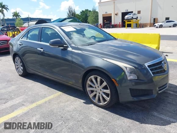 ✅ 2014 Cadillac ATS Luxury RWD • VIN: 1G6AB5RAXE0142079 • Lot: 42517963. Listed on IAAI with 140,118 mi. Free auction sales archive from the USA and detailed vehicle history report at DreamBid. Image 1.
