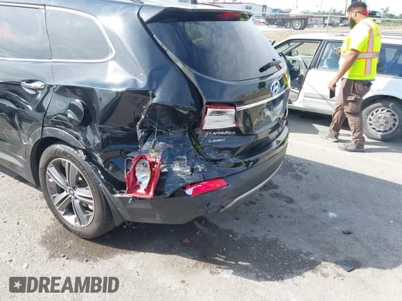 ✅ 2014 Hyundai Santa Fe GLS • VIN: KM8SN4HF9EU078833 • Лот: 43163419. Опубликован ранее на IAAI с пробегом 148 066 миль. Бесплатный доступ к архиву аукционных продаж из США и подробный отчёт об истории автомобиля на DreamBid. Изображение 17.