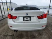 ✅ 2015 BMW 4 Series 428i • VIN: WBA4A5C52FD410672 • Lot: 66146915. Listed on Copart with 65,457 mi. Free auction sales archive from the USA and detailed vehicle history report at DreamBid. Image 6.