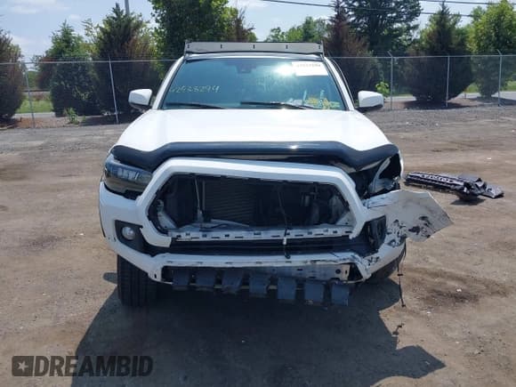 ✅ 2018 Toyota Tacoma SR • VIN: 3TMCZ5AN5JM152963 • Lot: 42933294. Listed on IAAI with 81,876 mi. Free auction sales archive from the USA and detailed vehicle history report at DreamBid. Image 12.