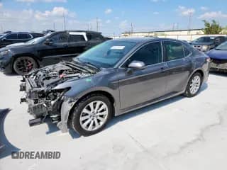 2019 Toyota Camry LE with VIN 4T1B11HK7KU815143, listed as a Copart auction lot 69475835 with 122,992 mi miles and Salvage title. Bid and sale history available at DreamBid. Image 1.