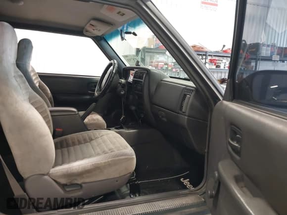 ✅ 1999 Jeep Cherokee SE • VIN: 1J4FF27S0XL575410 • Lot: 42787311. Listed on IAAI with 174,830 mi. Free auction sales archive from the USA and detailed vehicle history report at DreamBid. Image 5.