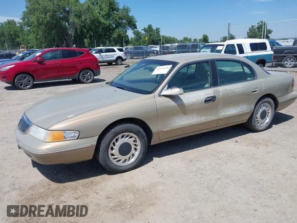 ✅ 1996 Lincoln Continental • VIN: 1LNLM97V0TY642100 • Lot: 42425141. Listed on IAAI with 174,277 mi. Free auction sales archive from the USA and detailed vehicle history report at DreamBid. Image 2.
