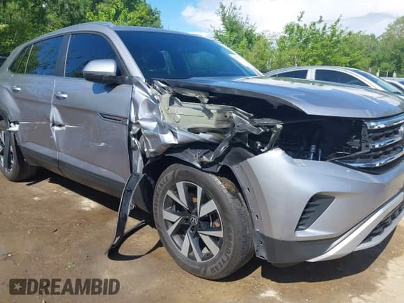 ✅ 2023 Volkswagen Atlas SE • VIN: 1V2LC2CA9PC212519 • Lot: 42177771. Listed on IAAI with 58,505 mi. Free auction sales archive from the USA and detailed vehicle history report at DreamBid. Image 6.