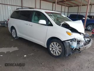 ✅ 2015 Toyota Sienna Limited • VIN: 5TDDK3DC9FS114814 • Lot: 42100413. Listed on IAAI with 157,761 mi. Free auction sales archive from the USA and detailed vehicle history report at DreamBid. Image 1.