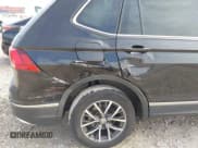 ✅ 2020 Volkswagen Tiguan SE • VIN: 3VV2B7AX5LM097691 • Лот: 43649943. Опубликован ранее на IAAI с пробегом 84 004 миль. Бесплатный доступ к архиву аукционных продаж из США и подробный отчёт об истории автомобиля на DreamBid. Изображение 6.