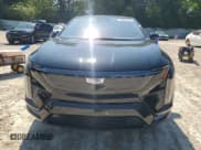 ✅ 2025 Cadillac Optiq Sport • VIN: 3GYK3EMR1SS188989 • Лот: 62065105. Опубликован ранее на Copart с пробегом 1 562 миль. Бесплатный доступ к архиву аукционных продаж из США и подробный отчёт об истории автомобиля на DreamBid. Изображение 5.