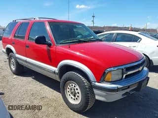 ✅ 1996 Chevrolet Blazer • VIN: 1GNDT13W9T2182490 • Lot: 41870679. Wystawiony na IAAI z przebiegiem 194 370 mil. Bezpłatny archiwum sprzedaży aukcyjnych z USA i szczegółowy raport historii pojazdu na DreamBid. Zdjęcie 1.