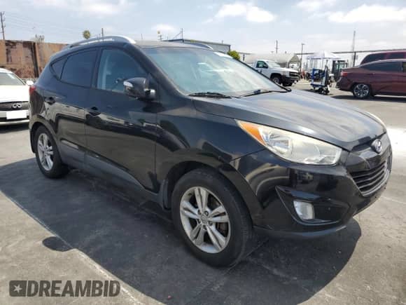 2013 Hyundai Tucson GLS z VIN KM8JU3AC3DU714296, wystawiony jako Copart lot #64865045 z przebiegiem 193 092 mil mil oraz Szkoda całkowita • Salvage title. Historia ofert i sprzedaży dostępna na DreamBid. Obrazek 4.